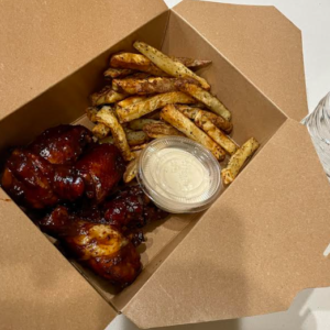 Honey Glazed Chicken Wings, Crispy French Fries, and Soda